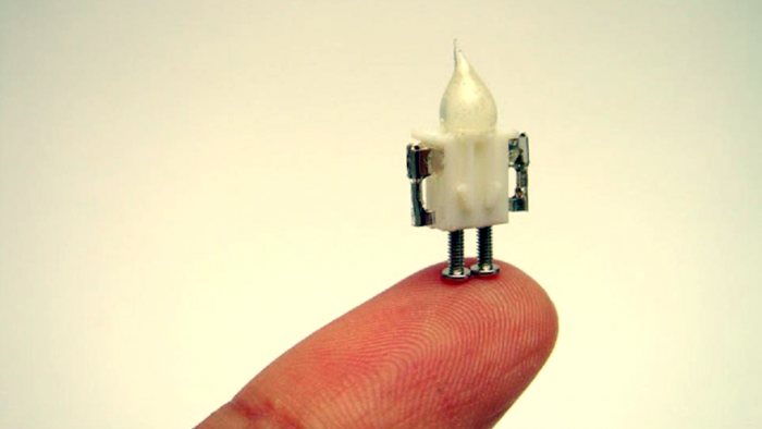 Miniature robot designs from scrap metal